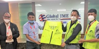 Global IME Bank Limited handover press jackets to photo journalists