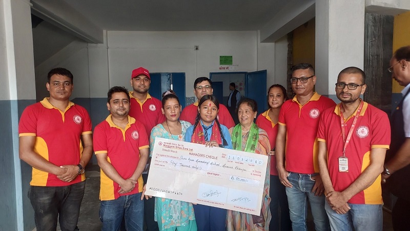 Mahalaxmi Bikas Bank has handed over Ashok Shrestha scholarship